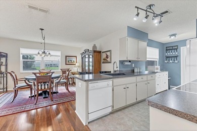 TRANQUIL WATERFRONT LIVING IN THE HEART OF ROTONDA on Rotonda Golf and Country Club The Hills Course in Florida - for sale on GolfHomes.com, golf home, golf lot