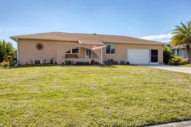 TRANQUIL WATERFRONT LIVING IN THE HEART OF ROTONDA on Rotonda Golf and Country Club The Hills Course in Florida - for sale on GolfHomes.com, golf home, golf lot