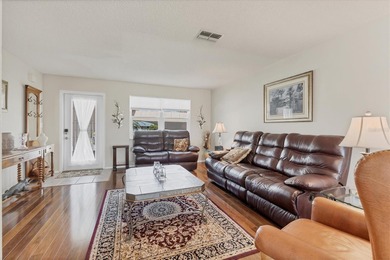 TRANQUIL WATERFRONT LIVING IN THE HEART OF ROTONDA on Rotonda Golf and Country Club The Hills Course in Florida - for sale on GolfHomes.com, golf home, golf lot