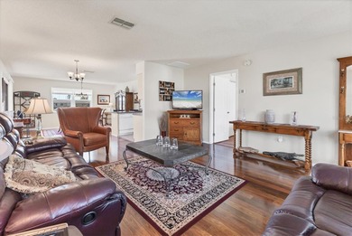 TRANQUIL WATERFRONT LIVING IN THE HEART OF ROTONDA on Rotonda Golf and Country Club The Hills Course in Florida - for sale on GolfHomes.com, golf home, golf lot