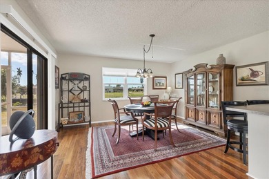 TRANQUIL WATERFRONT LIVING IN THE HEART OF ROTONDA on Rotonda Golf and Country Club The Hills Course in Florida - for sale on GolfHomes.com, golf home, golf lot