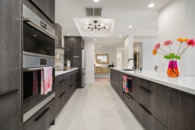 A sophisticated desert retreat in the guard-gated Desert Island on Desert Island Golf and Country Club in California - for sale on GolfHomes.com, golf home, golf lot