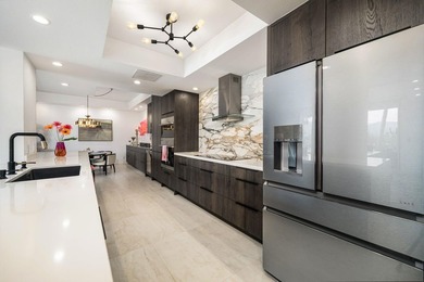 A sophisticated desert retreat in the guard-gated Desert Island on Desert Island Golf and Country Club in California - for sale on GolfHomes.com, golf home, golf lot