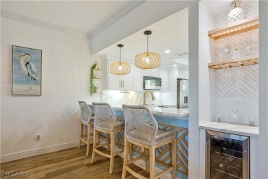This fully remodeled, turnkey first-floor residence in the on Club at Pelican Bay Golf Course in Florida - for sale on GolfHomes.com, golf home, golf lot