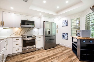 This fully remodeled, turnkey first-floor residence in the on Club at Pelican Bay Golf Course in Florida - for sale on GolfHomes.com, golf home, golf lot