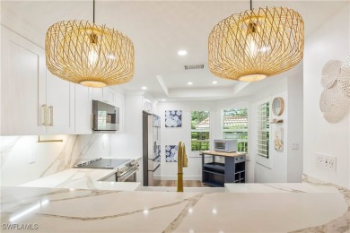 This fully remodeled, turnkey first-floor residence in the on Club at Pelican Bay Golf Course in Florida - for sale on GolfHomes.com, golf home, golf lot