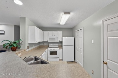 1500 SF 3 BR 2 BA end unit on the FIRST FLOOR rarely come on Windsor Parke Golf Club in Florida - for sale on GolfHomes.com, golf home, golf lot