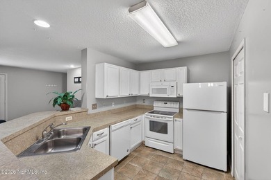 1500 SF 3 BR 2 BA end unit on the FIRST FLOOR rarely come on Windsor Parke Golf Club in Florida - for sale on GolfHomes.com, golf home, golf lot