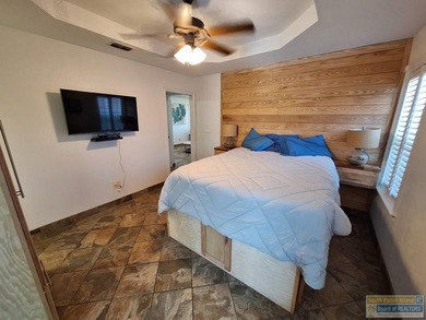 Are you looking for a vacation home in an amenity rich resort on Long Island Golf Course in Texas - for sale on GolfHomes.com, golf home, golf lot