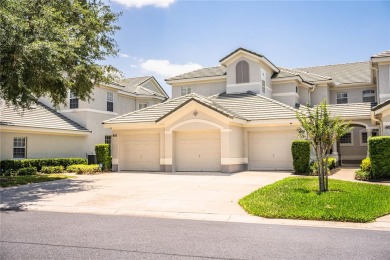 Welcome to this Exquisite Condominium in Lakeland's gorgeous on Grasslands Golf and Country Club in Florida - for sale on GolfHomes.com, golf home, golf lot