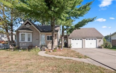 Discover this inviting 2-bed, 2-bath home that blends character on Evergreen Hills Golf Course in Michigan - for sale on GolfHomes.com, golf home, golf lot