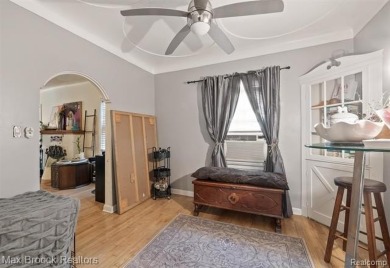 Discover this inviting 2-bed, 2-bath home that blends character on Evergreen Hills Golf Course in Michigan - for sale on GolfHomes.com, golf home, golf lot