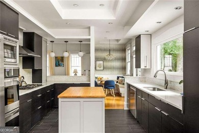 Perched proudly atop a hill in the heart of Candler Park, this on Candler Park Golf Course in Georgia - for sale on GolfHomes.com, golf home, golf lot