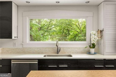 Perched proudly atop a hill in the heart of Candler Park, this on Candler Park Golf Course in Georgia - for sale on GolfHomes.com, golf home, golf lot