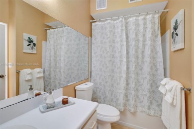BRIGHT AND BEAUTIFULLY PRESENTED 2 BED / 2 BATH CONDO IN ROYAL on Gateway Golf and Country Club in Florida - for sale on GolfHomes.com, golf home, golf lot