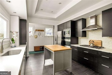 Perched proudly atop a hill in the heart of Candler Park, this on Candler Park Golf Course in Georgia - for sale on GolfHomes.com, golf home, golf lot