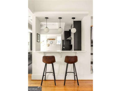 Perched proudly atop a hill in the heart of Candler Park, this on Candler Park Golf Course in Georgia - for sale on GolfHomes.com, golf home, golf lot