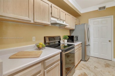 BRIGHT AND BEAUTIFULLY PRESENTED 2 BED / 2 BATH CONDO IN ROYAL on Gateway Golf and Country Club in Florida - for sale on GolfHomes.com, golf home, golf lot