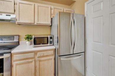 BRIGHT AND BEAUTIFULLY PRESENTED 2 BED / 2 BATH CONDO IN ROYAL on Gateway Golf and Country Club in Florida - for sale on GolfHomes.com, golf home, golf lot