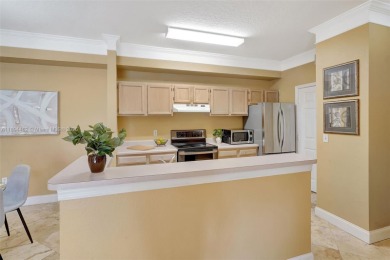 BRIGHT AND BEAUTIFULLY PRESENTED 2 BED / 2 BATH CONDO IN ROYAL on Gateway Golf and Country Club in Florida - for sale on GolfHomes.com, golf home, golf lot