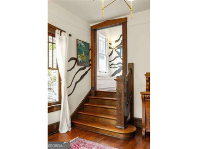 Perched proudly atop a hill in the heart of Candler Park, this on Candler Park Golf Course in Georgia - for sale on GolfHomes.com, golf home, golf lot