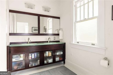 Perched proudly atop a hill in the heart of Candler Park, this on Candler Park Golf Course in Georgia - for sale on GolfHomes.com, golf home, golf lot