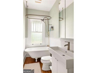 Perched proudly atop a hill in the heart of Candler Park, this on Candler Park Golf Course in Georgia - for sale on GolfHomes.com, golf home, golf lot