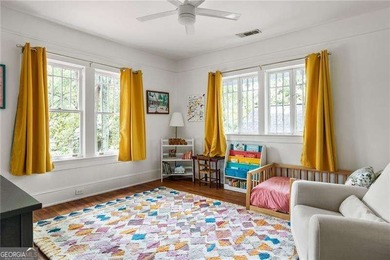 Perched proudly atop a hill in the heart of Candler Park, this on Candler Park Golf Course in Georgia - for sale on GolfHomes.com, golf home, golf lot