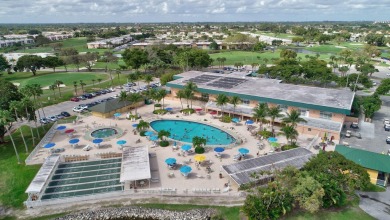 Totally remodeled 1/1.5 condo located in Kings Point. Laminate on Kings Point Golf -Flanders Way in Florida - for sale on GolfHomes.com, golf home, golf lot