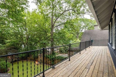 Perched proudly atop a hill in the heart of Candler Park, this on Candler Park Golf Course in Georgia - for sale on GolfHomes.com, golf home, golf lot