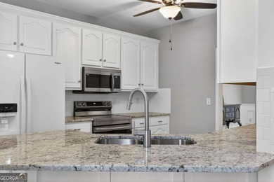 Tucked inside the gated, resort-style community of Fairfield on Fairfield Plantation Golf and Country Club in Georgia - for sale on GolfHomes.com, golf home, golf lot