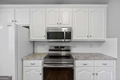 Tucked inside the gated, resort-style community of Fairfield on Fairfield Plantation Golf and Country Club in Georgia - for sale on GolfHomes.com, golf home, golf lot