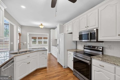 Tucked inside the gated, resort-style community of Fairfield on Fairfield Plantation Golf and Country Club in Georgia - for sale on GolfHomes.com, golf home, golf lot