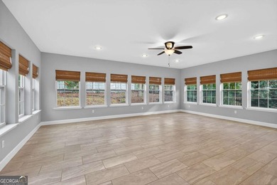 Tucked inside the gated, resort-style community of Fairfield on Fairfield Plantation Golf and Country Club in Georgia - for sale on GolfHomes.com, golf home, golf lot