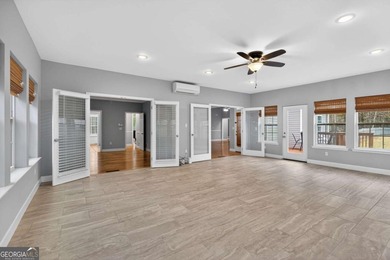 Tucked inside the gated, resort-style community of Fairfield on Fairfield Plantation Golf and Country Club in Georgia - for sale on GolfHomes.com, golf home, golf lot