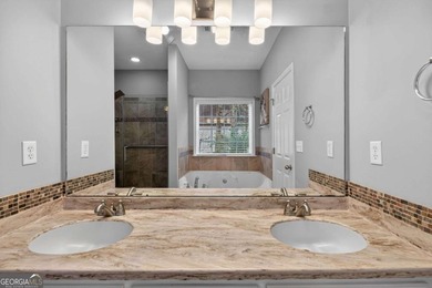 Tucked inside the gated, resort-style community of Fairfield on Fairfield Plantation Golf and Country Club in Georgia - for sale on GolfHomes.com, golf home, golf lot