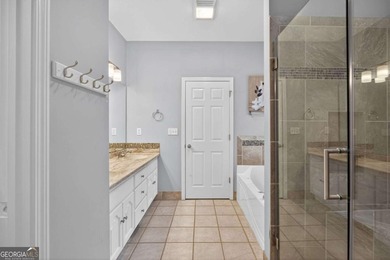 Tucked inside the gated, resort-style community of Fairfield on Fairfield Plantation Golf and Country Club in Georgia - for sale on GolfHomes.com, golf home, golf lot