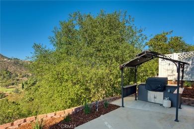 Presenting a single-family residence offering an elevated living on  in California - for sale on GolfHomes.com, golf home, golf lot