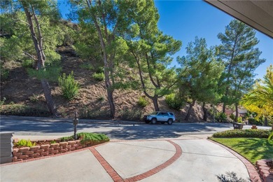 Presenting a single-family residence offering an elevated living on  in California - for sale on GolfHomes.com, golf home, golf lot