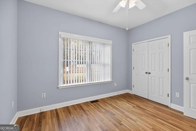 Tucked inside the gated, resort-style community of Fairfield on Fairfield Plantation Golf and Country Club in Georgia - for sale on GolfHomes.com, golf home, golf lot