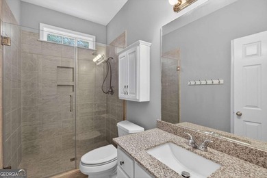 Tucked inside the gated, resort-style community of Fairfield on Fairfield Plantation Golf and Country Club in Georgia - for sale on GolfHomes.com, golf home, golf lot