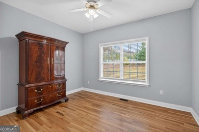 Tucked inside the gated, resort-style community of Fairfield on Fairfield Plantation Golf and Country Club in Georgia - for sale on GolfHomes.com, golf home, golf lot