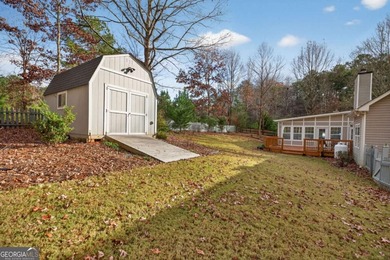 Tucked inside the gated, resort-style community of Fairfield on Fairfield Plantation Golf and Country Club in Georgia - for sale on GolfHomes.com, golf home, golf lot