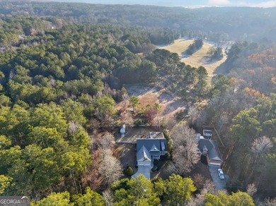 Tucked inside the gated, resort-style community of Fairfield on Fairfield Plantation Golf and Country Club in Georgia - for sale on GolfHomes.com, golf home, golf lot