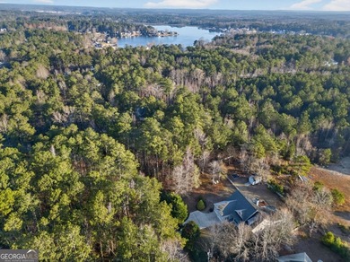 Tucked inside the gated, resort-style community of Fairfield on Fairfield Plantation Golf and Country Club in Georgia - for sale on GolfHomes.com, golf home, golf lot