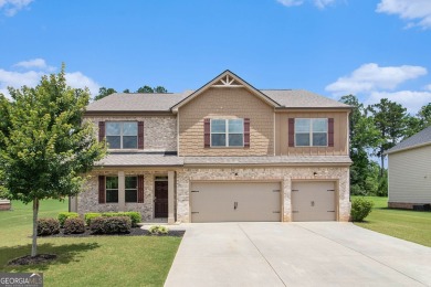 Welcome to refined living in the prestigious, gated community of on Canongate At Heron Bay in Georgia - for sale on GolfHomes.com, golf home, golf lot