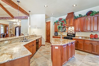 Perfectly positioned on the 10th green of the Angel Fire Resort on Angel Fire Resort Country Club in New Mexico - for sale on GolfHomes.com, golf home, golf lot