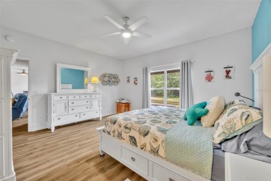 Presenting a well-maintained 2-bedroom, 2-bathroom home with an on Lake Ashton Golf Club in Florida - for sale on GolfHomes.com, golf home, golf lot
