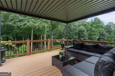 Welcome to this beautifully updated brick-front home offering a on Hamilton Mill Golf Club in Georgia - for sale on GolfHomes.com, golf home, golf lot