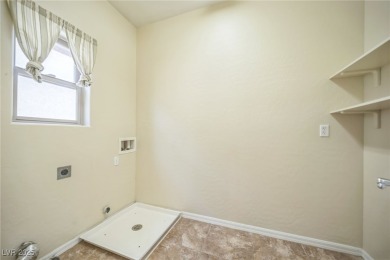 Assumable VA Loan at 2.875%. Stunning 3-bed, 2.5-bath home in on Badlands Golf Club in Nevada - for sale on GolfHomes.com, golf home, golf lot